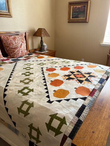 Pumpkin spice quilt top in the guest room