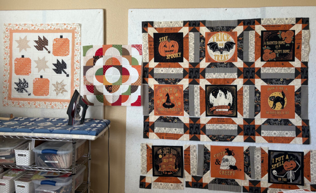 sewing room with fall projects on design walls