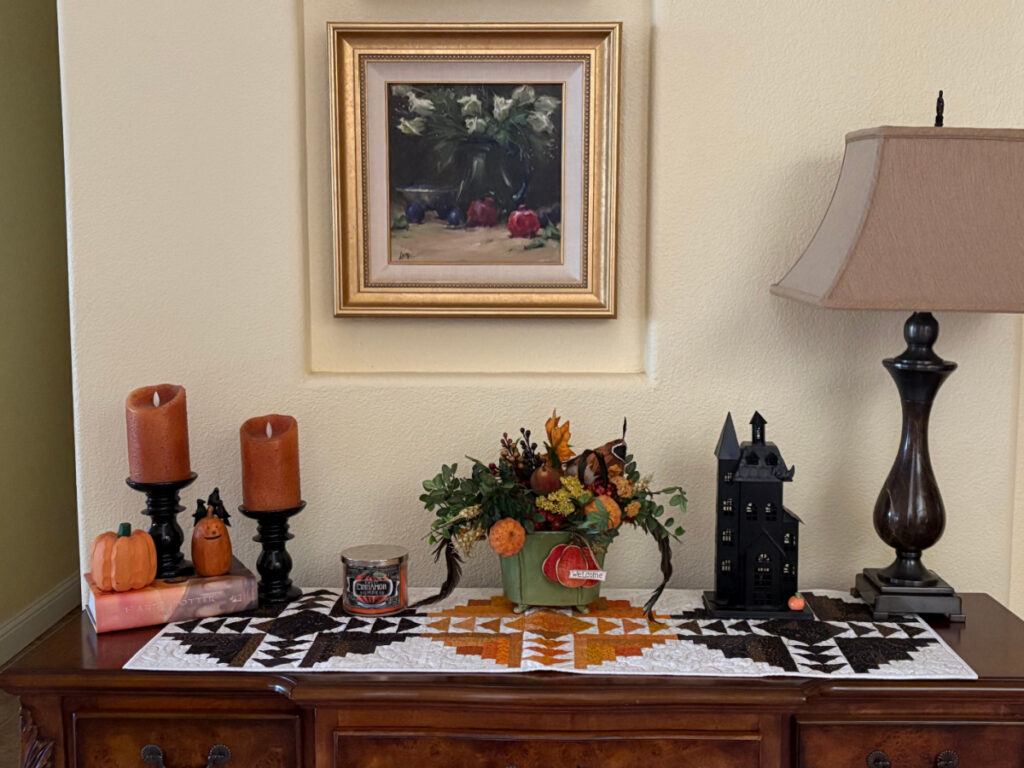 hall table with halloween decor